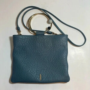 Thacker dusty blue leather crossbody bag with bracelet top handle